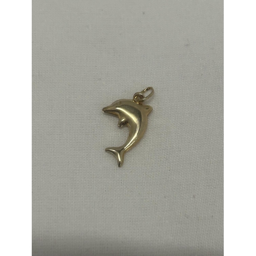 548 - A 9CT YELLOW GOLD DOLPHIN CHARM