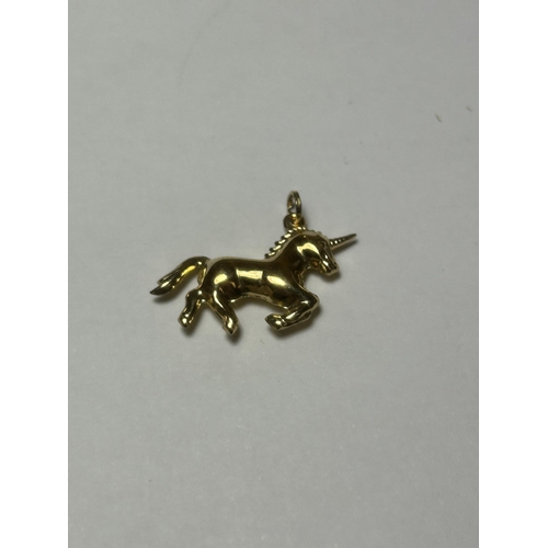 549 - A 9CT YELLOW GOLD UNICORN CHARM