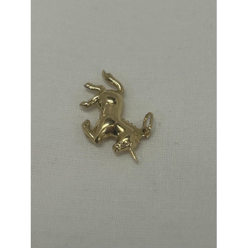 549 - A 9CT YELLOW GOLD UNICORN CHARM