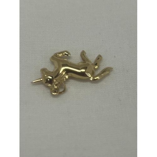 549 - A 9CT YELLOW GOLD UNICORN CHARM