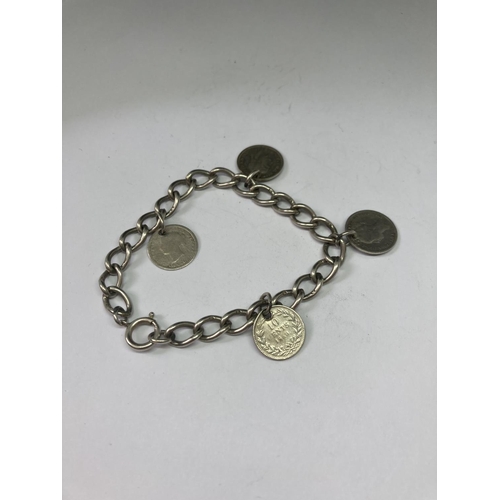 552 - A SILVER COIN CHARM BRACELET