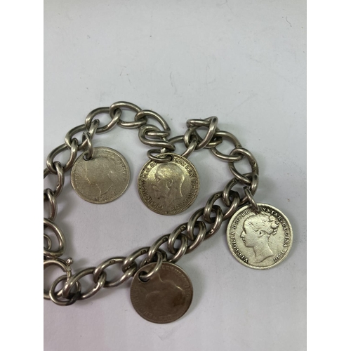 552 - A SILVER COIN CHARM BRACELET