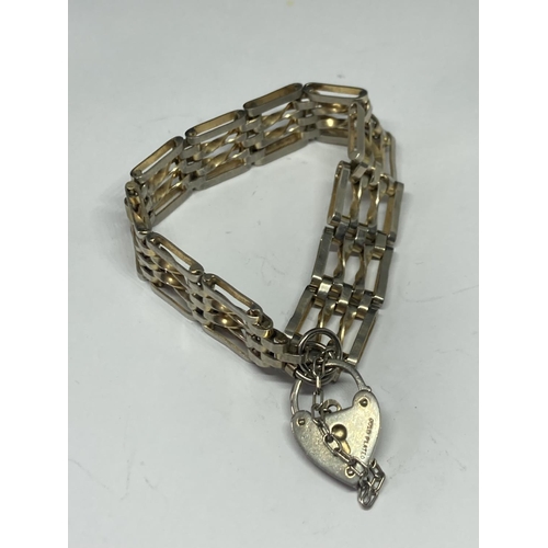 561 - A SILVER FOUR BAR GATE BRACELET