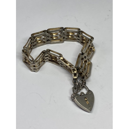 561 - A SILVER FOUR BAR GATE BRACELET