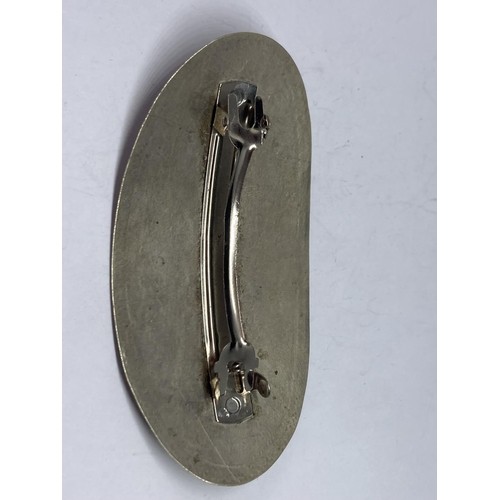 619 - A LOW GRADE SILVER HAIR CLIP