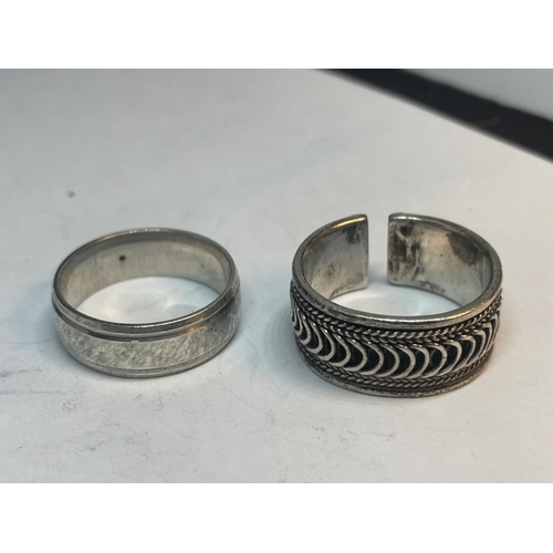 673 - FOUR VARIOUS SILVER RINGS