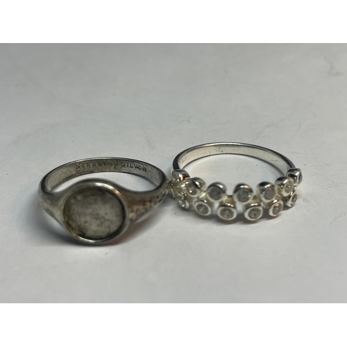 673 - FOUR VARIOUS SILVER RINGS