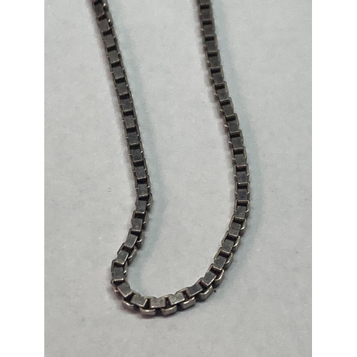 703 - TWO SILVER ITEMS TO INCLUDE A BOX CHAIN AND A MARCASITE RING SIZE M/N