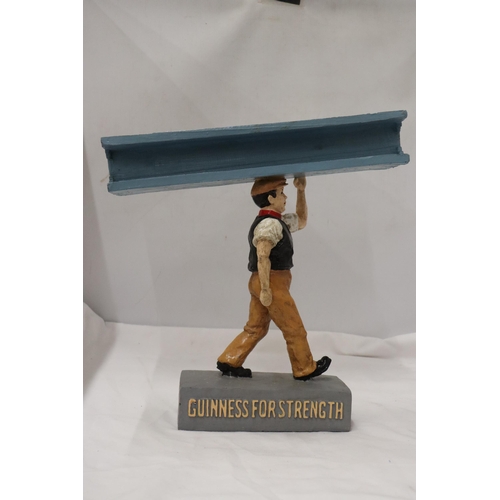 858 - A RESIN FIGURE, 'GUINNESS FOR STRENGTH', HEIGHT 36CM, WIDTH 34CM