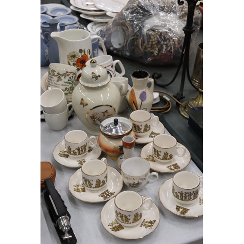 974 - A QUANTITY OF CERAMICS TO INCLUDE CLASSICAL THEMED CUPS AND SAUCERS, PLATES, A LIDDED JAR, PRESERVE ... 