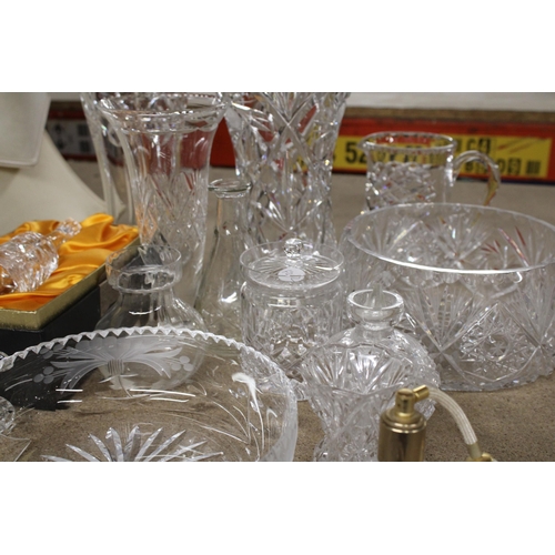 1235 - A QUANTITY OF HEAVY CUT GLASS TO INCLUDE VASES, BOWLS, JUGS, A PERFUME ATOMISER, BELL, ETC