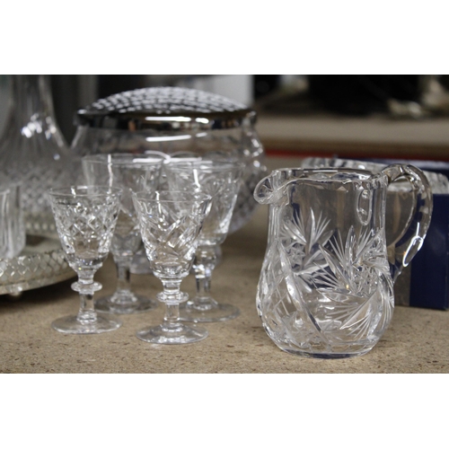 1301 - A QUANTITY OF CUT GLASS ITEMS TO INCLUDE A DECANTER, ROSE BOWL, ROUND GALLERIED TRAY, BOWL, JUG, GLA... 