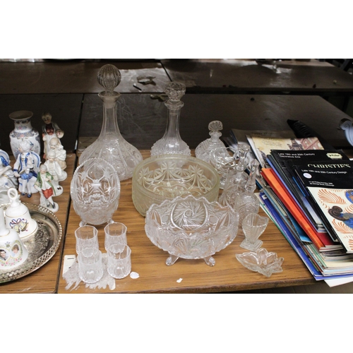 1305 - A QUANTITY OF GLASSWARE TO INCLUDE DECANTERS, BOWLS, BELLS, GLASSES, ETC