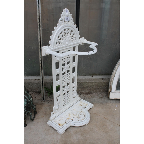 1511 - AN ANTIQUE CAST IRON STICK STAND WITH DRIP TRAY