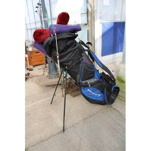 1649 - A PIVOT GOLF BAG AND AN ASSORTMENT OF GOLF CLUBS