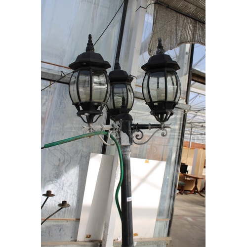 1651 - A VINTAGE STYLE THREE BRANCH COURTYARD LAMP