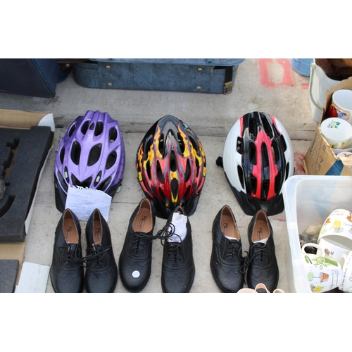 1893 - AN ASSORTMENT OF MENS AND LADIES SHOES AND THREE BIKE HELMETS