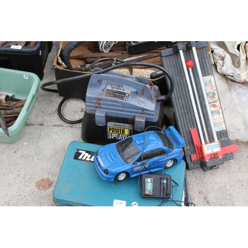 2141 - AN ASSORTMENT OF ITEMS TO INCLUDE A POWER SPRAYER, A MAKITA TOOL BOX AND A TILE CUTTER ETC