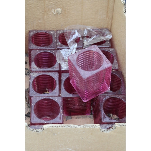 2184 - SEVENTEEN RED GLASS CANDLE HOLDERS