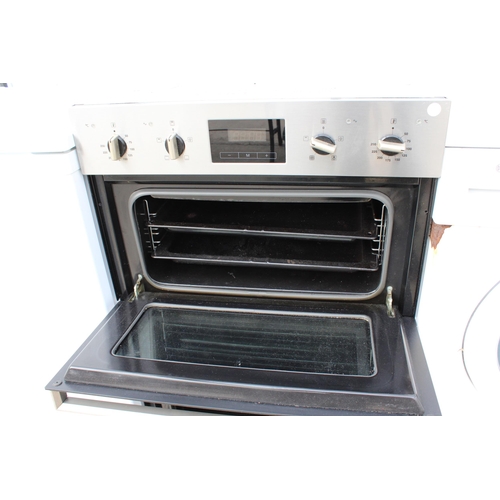 2327 - A CHROME AND BLACK BAUMATIC INTERGRATED DOUBLE OVEN