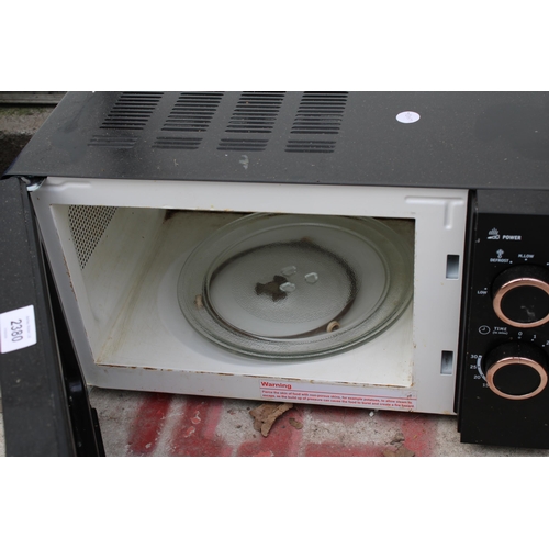 2380 - MICROWAVE WITH COPPER COLOURED TRIMS