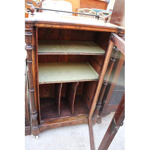 2556 - A VICTORIAN WALNUT MUSIC CABINET WITH GLASS DOOR, TURNED UPRIGHTS AND GALLERY BACK 23