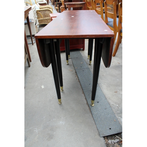 2585 - A RETRO TOLA WOOD POSSIBLY G PLAN E GOMME LIBRENZA (NO LABEL) DROP LEAF DINING TABLE ON BLACK TAPERI... 