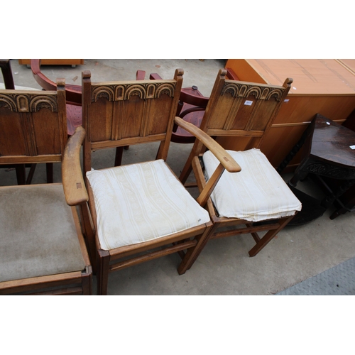 2617 - FOUR JAMES PHILLIPS AND SON OAK ARTS AND CRAFTS STYLE CHAIRS TWO BEING CARVERS