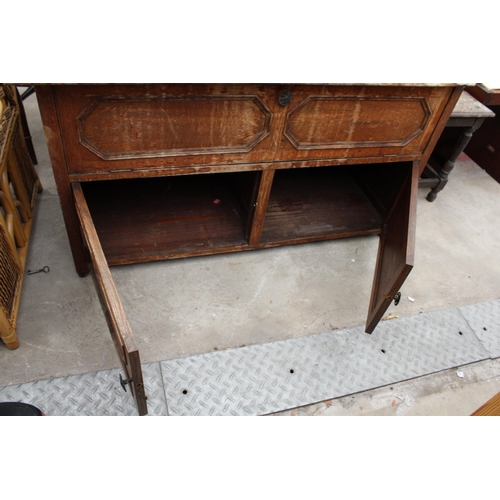 2637 - A MID 20TH CENTURY OAK CABINET