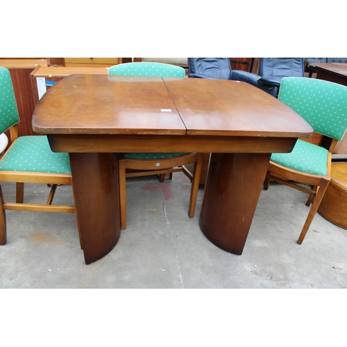 2681 - A MID 20TH CENTURY WALNUT EXTENDING DINING  TABLE AND FOUR CHAIRS