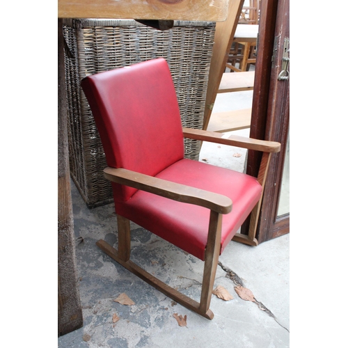 2714 - A MID 20TH CENTURY CHIDS ROCKING CHAIR