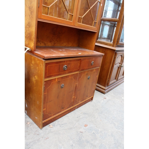 2728 - A BERESFORD AND HICKS LTD YEW WOOS TWO DOOR BOOKCASE ON BASE 36