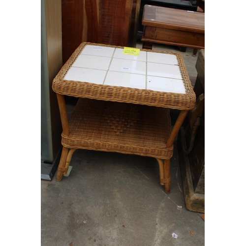 2818 - A TWO TIER WICKER LAMP TABLE WITH TILED TOP AND A GLASS FRONTED TWO DOOR BOOKCASE