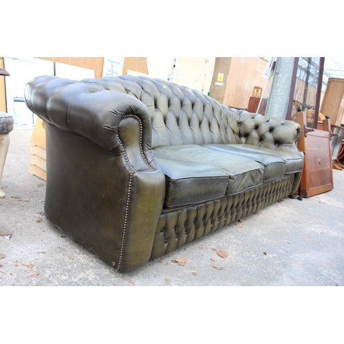 2958 - A GREEN LEATHER CHESTERFIELD FOUR SEATER SETTEE