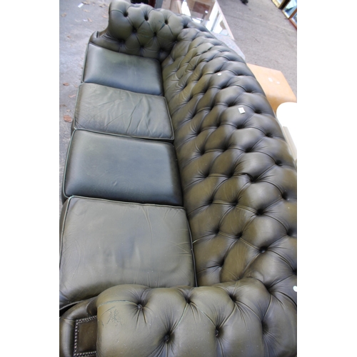 2958 - A GREEN LEATHER CHESTERFIELD FOUR SEATER SETTEE