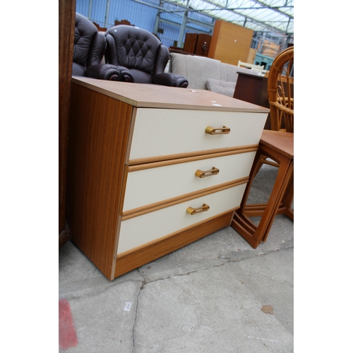 2973 - A RETRO TEAK EFFECT CHEST OF THREE DRAWERS, 31