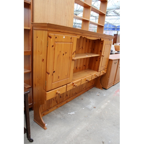 2977 - A PINE DRESSER RACK ENCLOSING CUPBARDS AND DRAWERS, 72