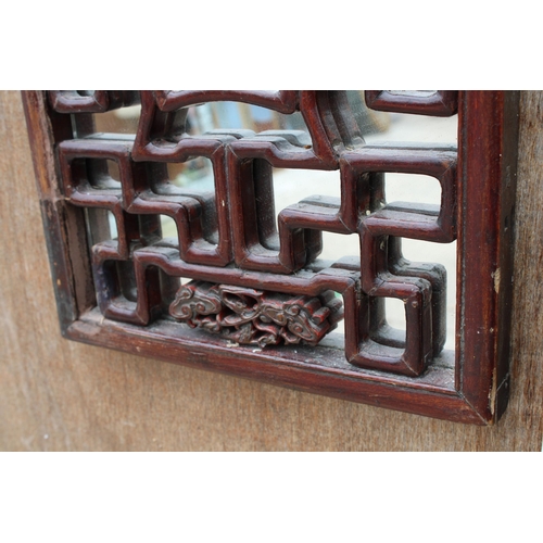 3011 - AN ORIENTAL HARDWOOD CARVED AND MIRRORED PANEL 33