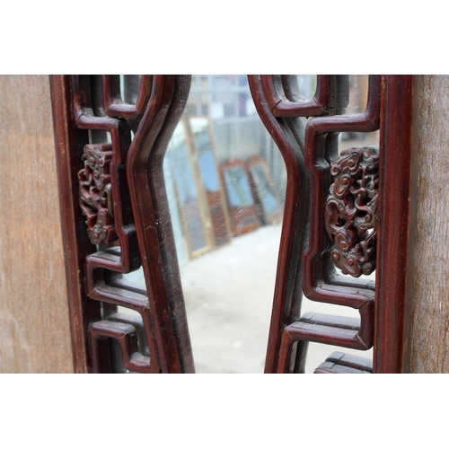 3011 - AN ORIENTAL HARDWOOD CARVED AND MIRRORED PANEL 33