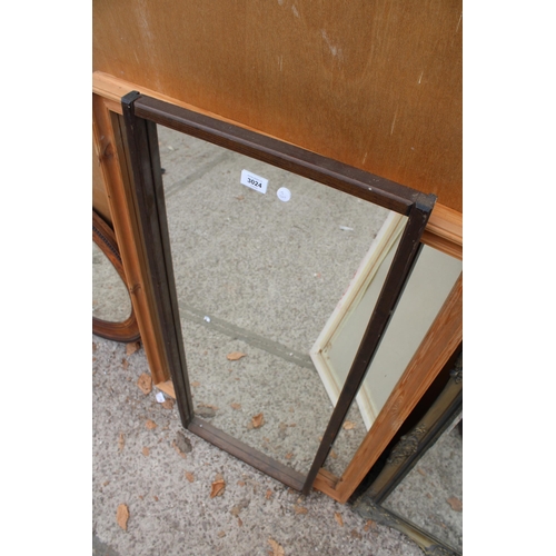 3024 - A BLACK FRAMED WALL MIRROR AND TWO OTHERS