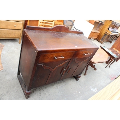 3093 - AN OAK ART DECO SIDEBOARD