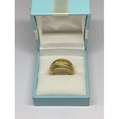 525 - A BOXED SILVER GILT RING