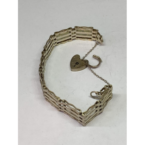 532 - A FOUR BAR SILVER GATE BRACELET