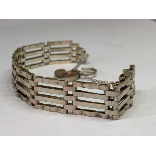 532 - A FOUR BAR SILVER GATE BRACELET