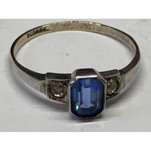 533 - 9CT GOLD ON SILVER BLUE STONE RING