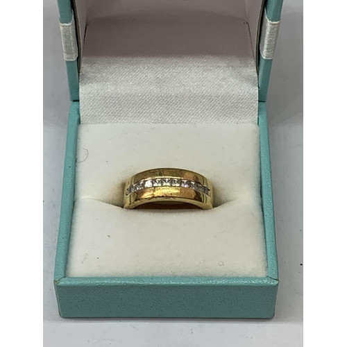 563 - A SILVER GILT AND STONE RING IN A PRESENTATION BOX