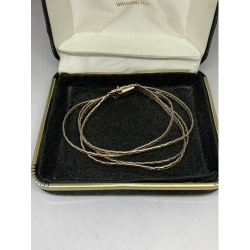 566 - A SILVER STRAND BRACELET IN A PRESENTATION BOX