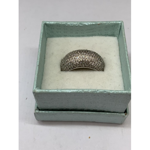 573 - A SILVER RING IN A PRESENTATION BOX