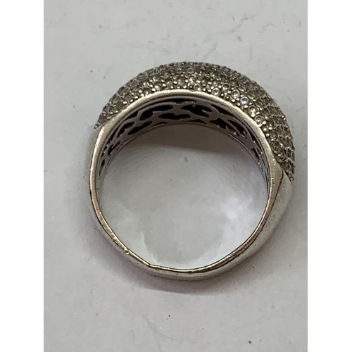 573 - A SILVER RING IN A PRESENTATION BOX