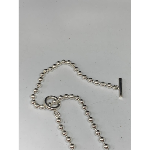 577 - A SILVER T BAR NECKLACE